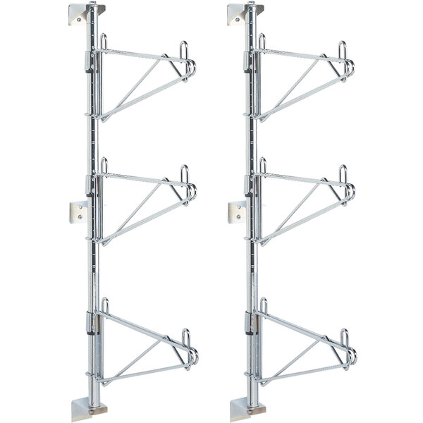 A pair of chrome Metro wall mount end units with three shelves on each side.