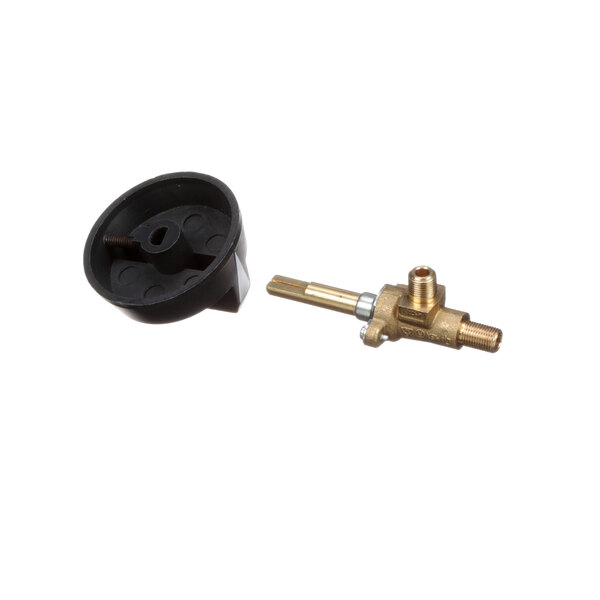A close-up of a Southbend brass burner valve with a black cap and a black hose.