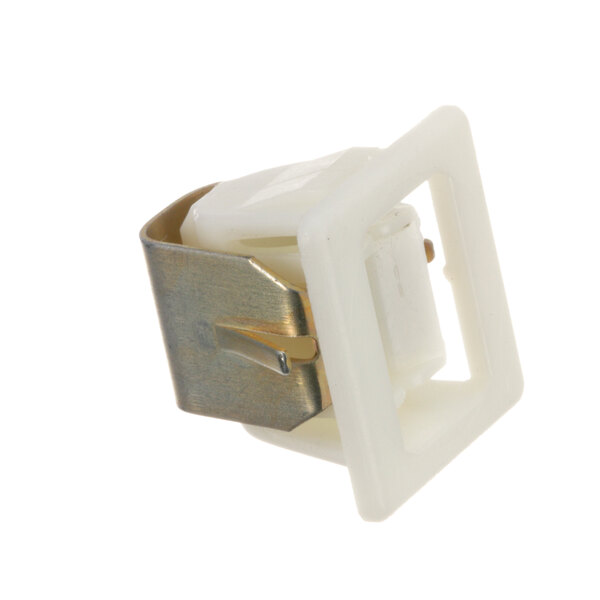 A close-up of a white plastic Hoshizaki latch with a metal clip.