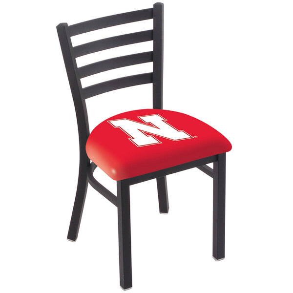 A black steel Holland Bar Stool chair with a red cushion featuring a white N logo.