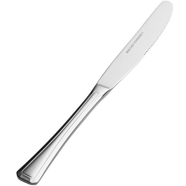 A Bon Chef stainless steel dinner knife with a solid silver handle.