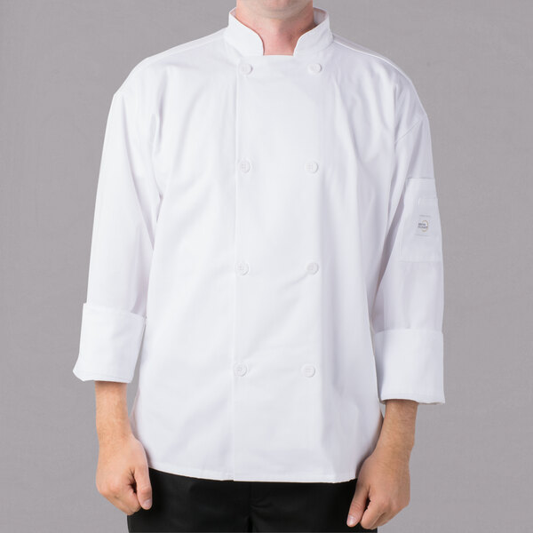 A man wearing a Mercer Culinary white chef coat with full mesh back.