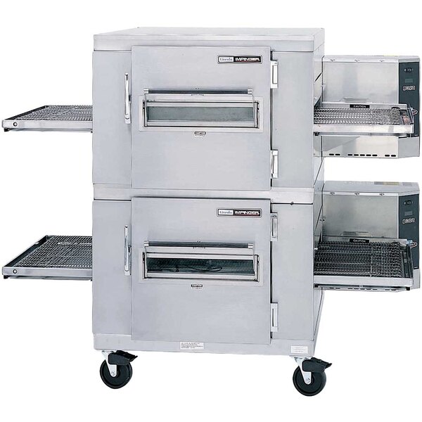 A large stainless steel Lincoln Impinger conveyor oven with two belts.