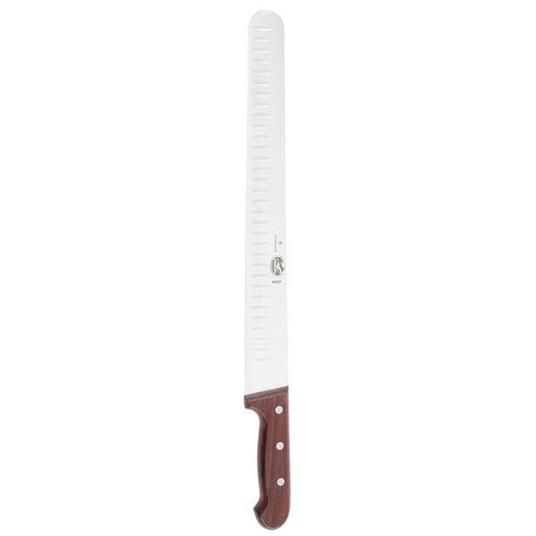 A Victorinox meat slicing knife with a brown rosewood handle.
