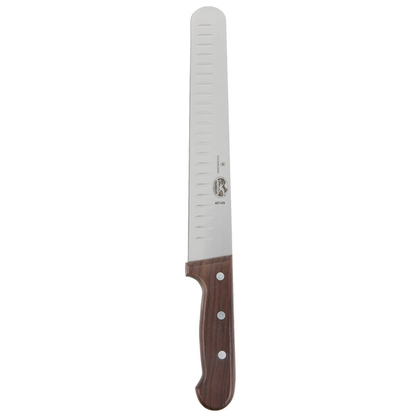 A Victorinox carving knife with a rosewood handle.