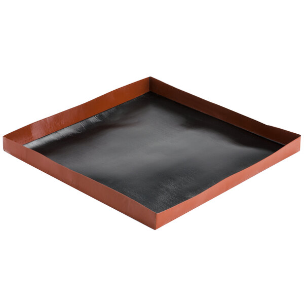 A black and brown square Teflon basket with a lid.