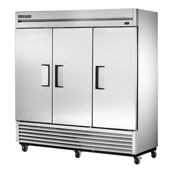 A large silver True reach-in freezer with two solid doors.