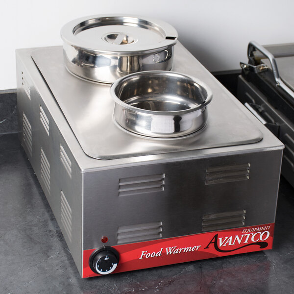 An Avantco countertop food warmer with two bowls on a stainless steel surface.