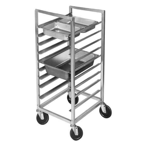 A Channel aluminum steam table pan rack holding metal trays.