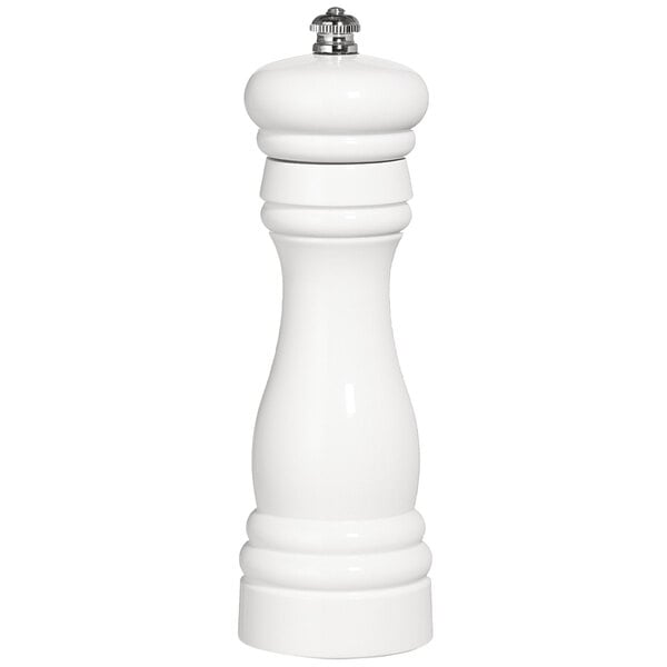 A white pepper mill with a silver top.