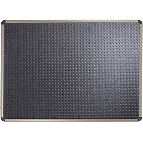 A Quartet bulletin board with a black foam surface and black aluminum frame.