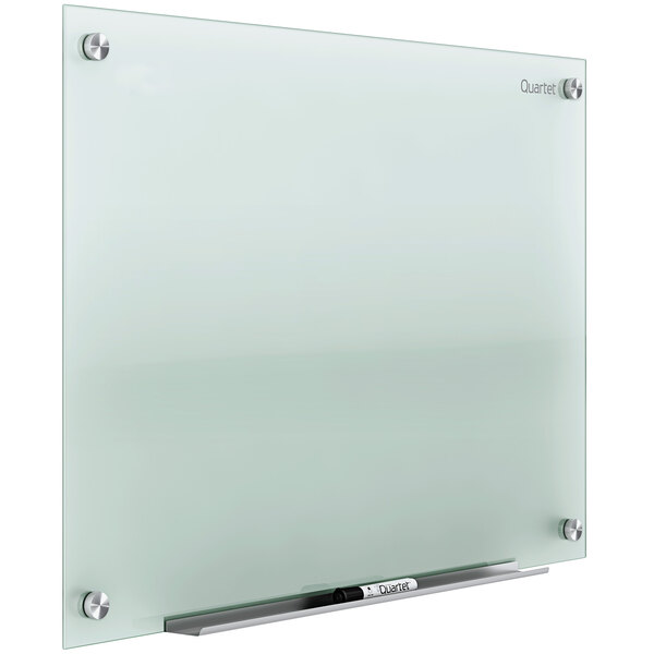 A Quartet frosted glass whiteboard with a silver metal frame.
