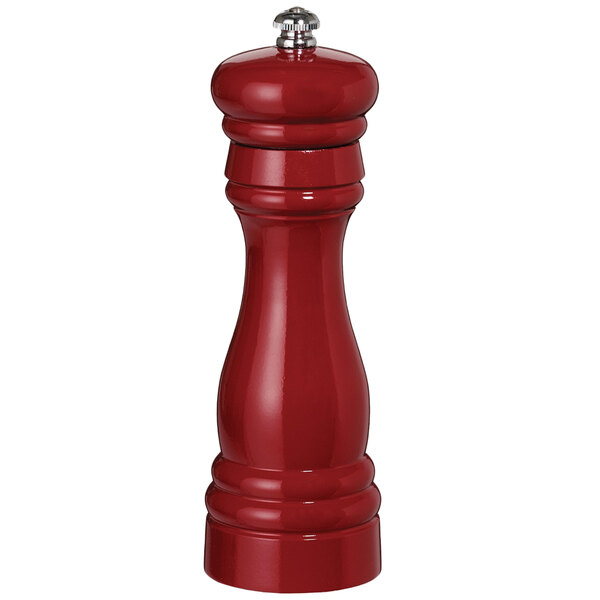 A red pepper mill with a silver top.