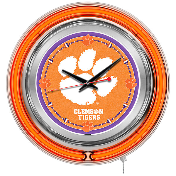 A white Holland Bar Stool clock with a Clemson University paw print logo in purple and orange neon tubes.