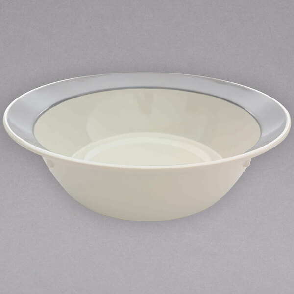 A white bowl with a grey rim.