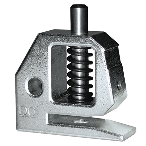 A metal Swingline punch head with a spring.