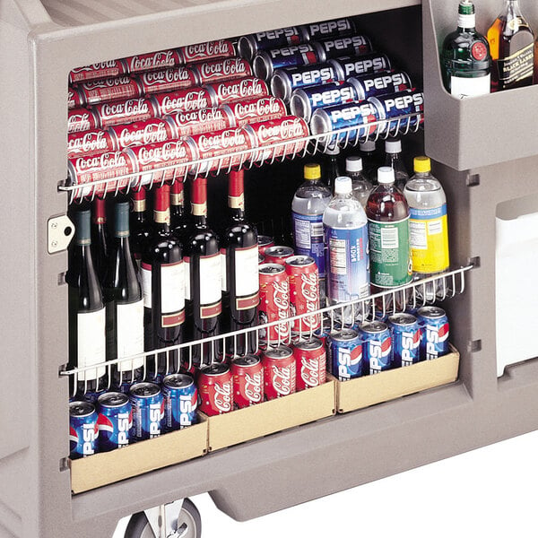 A Cambro wire shelf holding bottles and cans of beverages.