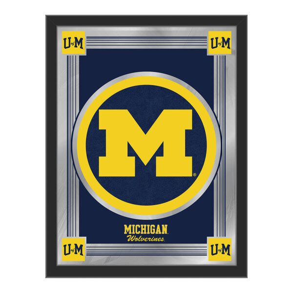 A white framed mirror with the University of Michigan logo in yellow and blue.
