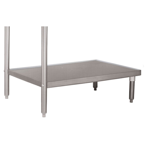 A stainless steel table with a metal undershelf.