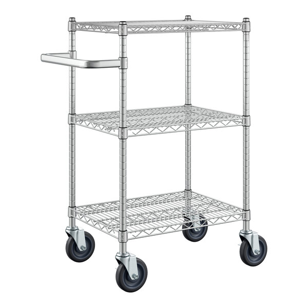 A silver metal Regency utility cart with three wire shelves and black wheels.