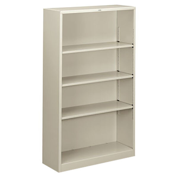 A light gray HON metal bookcase with four shelves.
