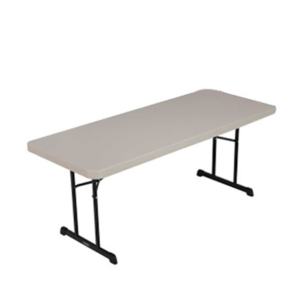 A rectangular Lifetime plastic folding table with black legs.