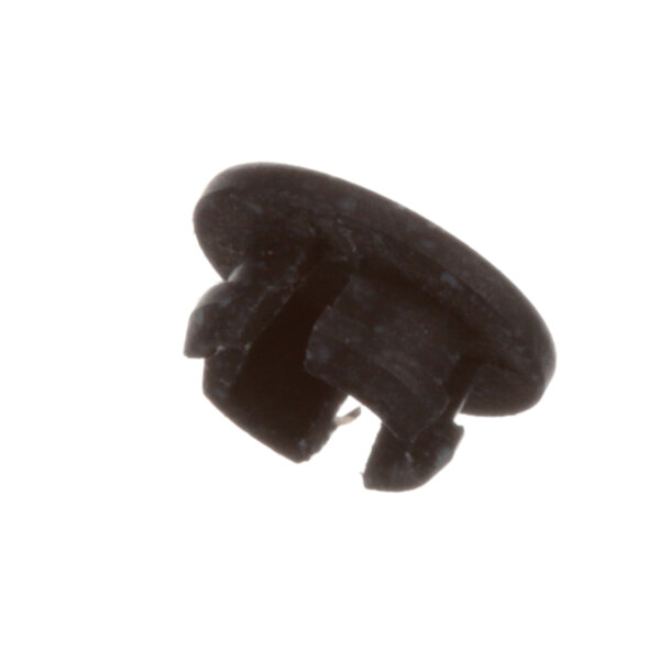 A close-up of a black plastic Amana plug-hole.