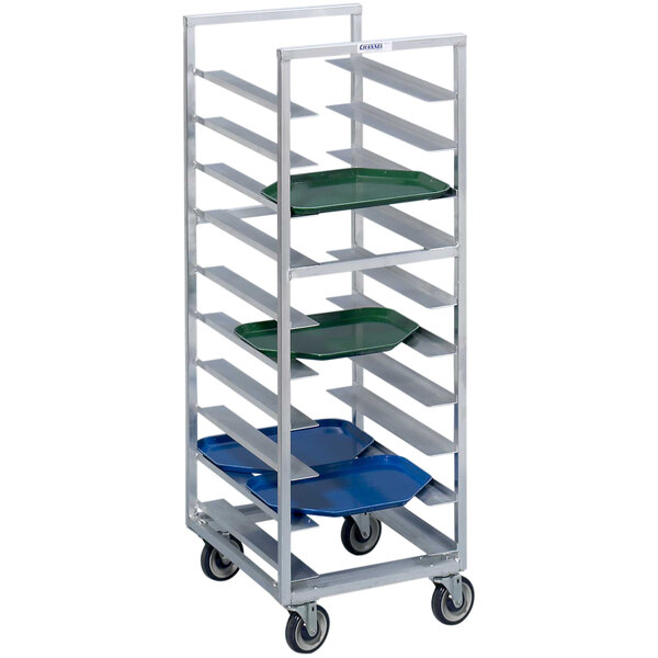 A metal Channel bottom load tray rack with blue trays on it.