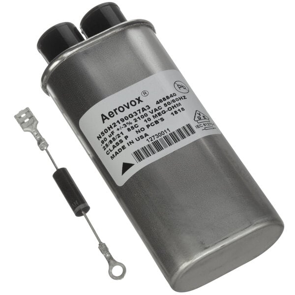 An Amana air-cooled capacitor with a wire attached.