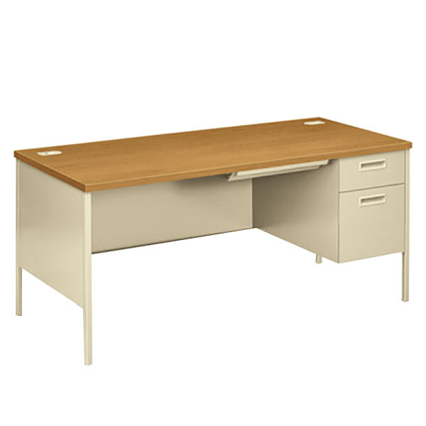 A HON Harvest/Putty metal right pedestal desk with drawers.