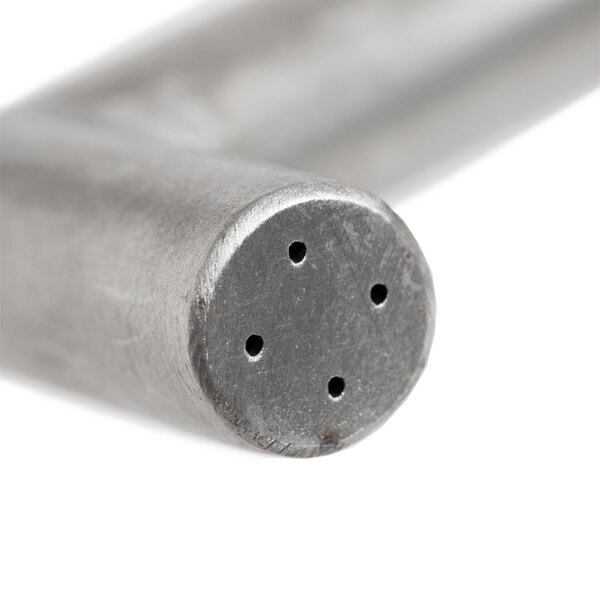 A metal water pipe with holes.