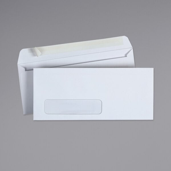 A close-up of a white Universal business envelope with a rectangular window.