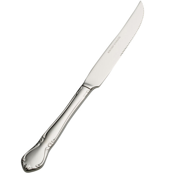 A close-up of a Bon Chef stainless steel steak knife with a solid handle.