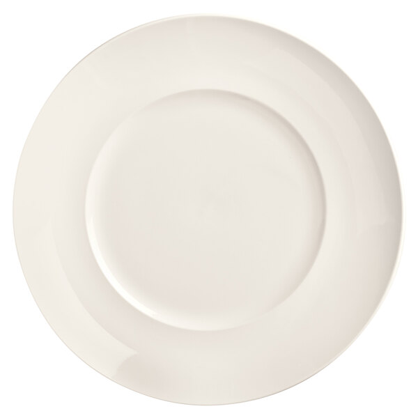 A Libbey Basics bright white porcelain plate with a round edge and white border.