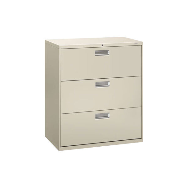 A light gray HON Brigade 3-drawer lateral filing cabinet.