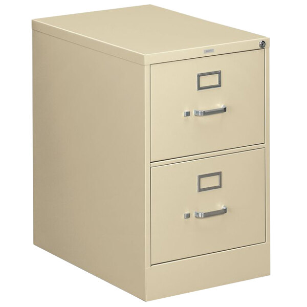 A HON putty filing cabinet with two drawers.