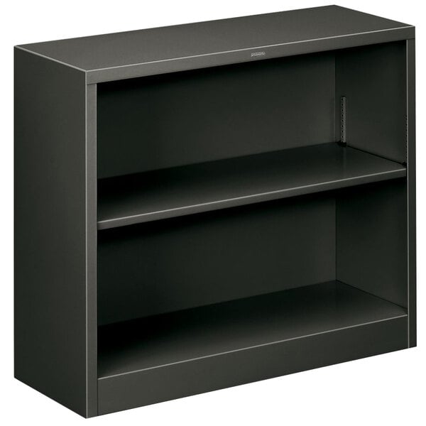 A black metal HON bookcase with two shelves.