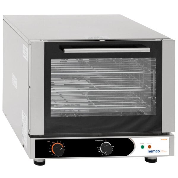 A Nemco countertop convection oven with a glass door and a metal shelf.