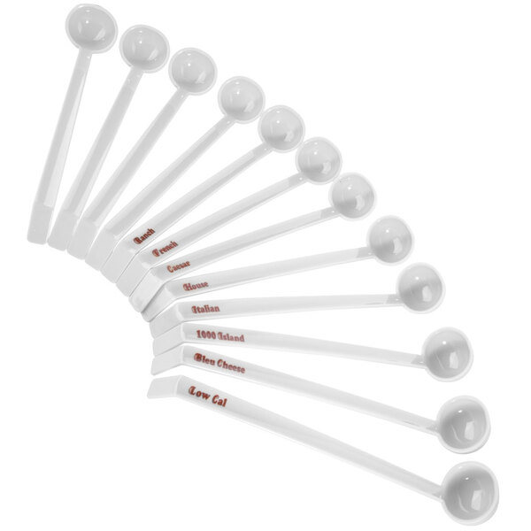 A group of white plastic Cambro ladles with 1 oz. printed labels.