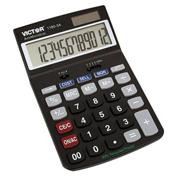 A close-up of a black Victor 12-digit desktop calculator with a white display.