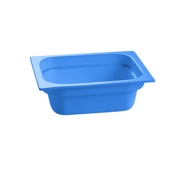 A cobalt blue cast aluminum food pan with a white background.
