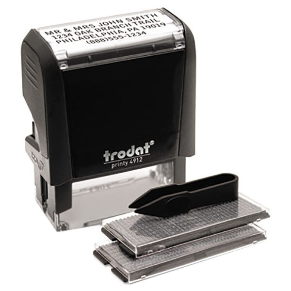 A Trodat customizable message stamp and stamper.