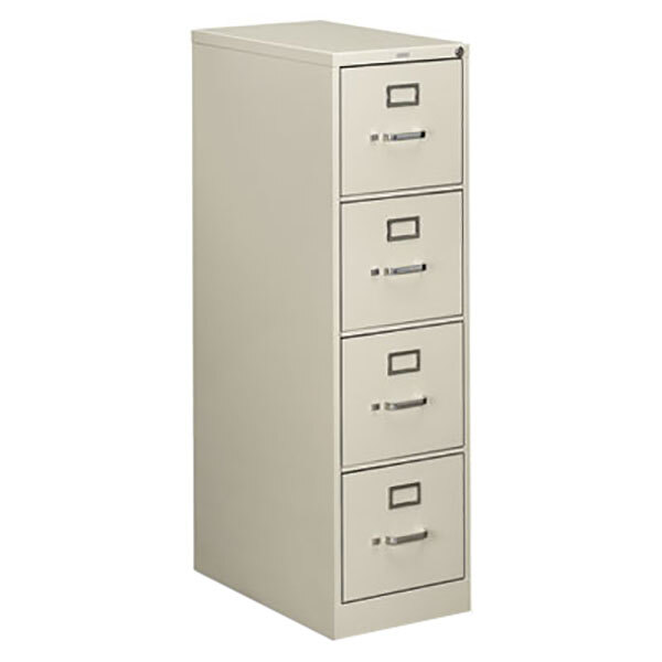 A light gray HON filing cabinet with four drawers.