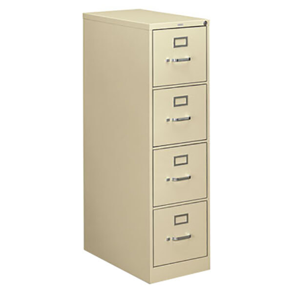 A HON putty filing cabinet with four drawers.