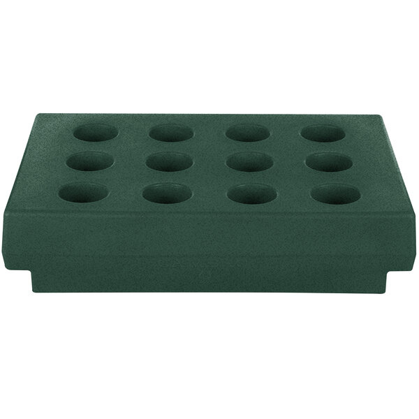 A green rectangular plastic tray with eight holes.