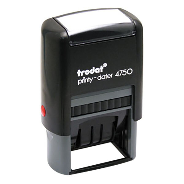 A black Trodat self-inking date stamp with white text and a red button.