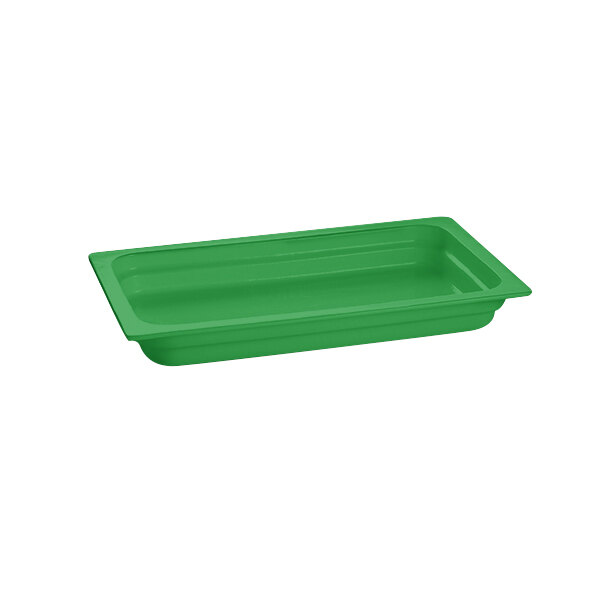 A green Tablecraft cast aluminum food pan on a counter.
