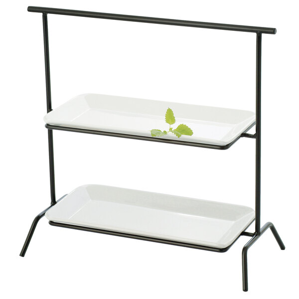 A white rectangular tray on a two-tiered black metal rack.