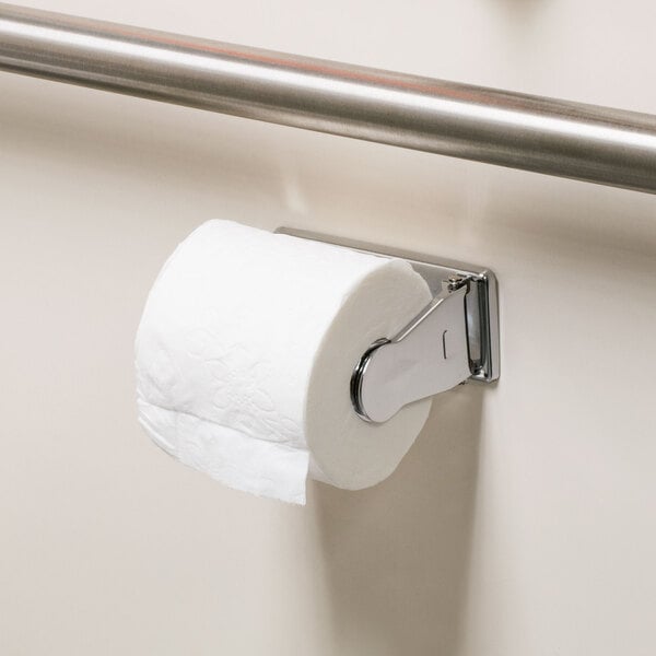 A Thunder Group metal toilet paper holder with a roll of toilet paper on it.