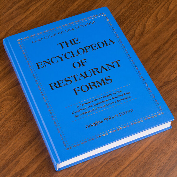 The Encyclopedia of Restaurant Forms book on a wood counter.
